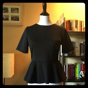 Black peplum 3/4 length sleeve blouse